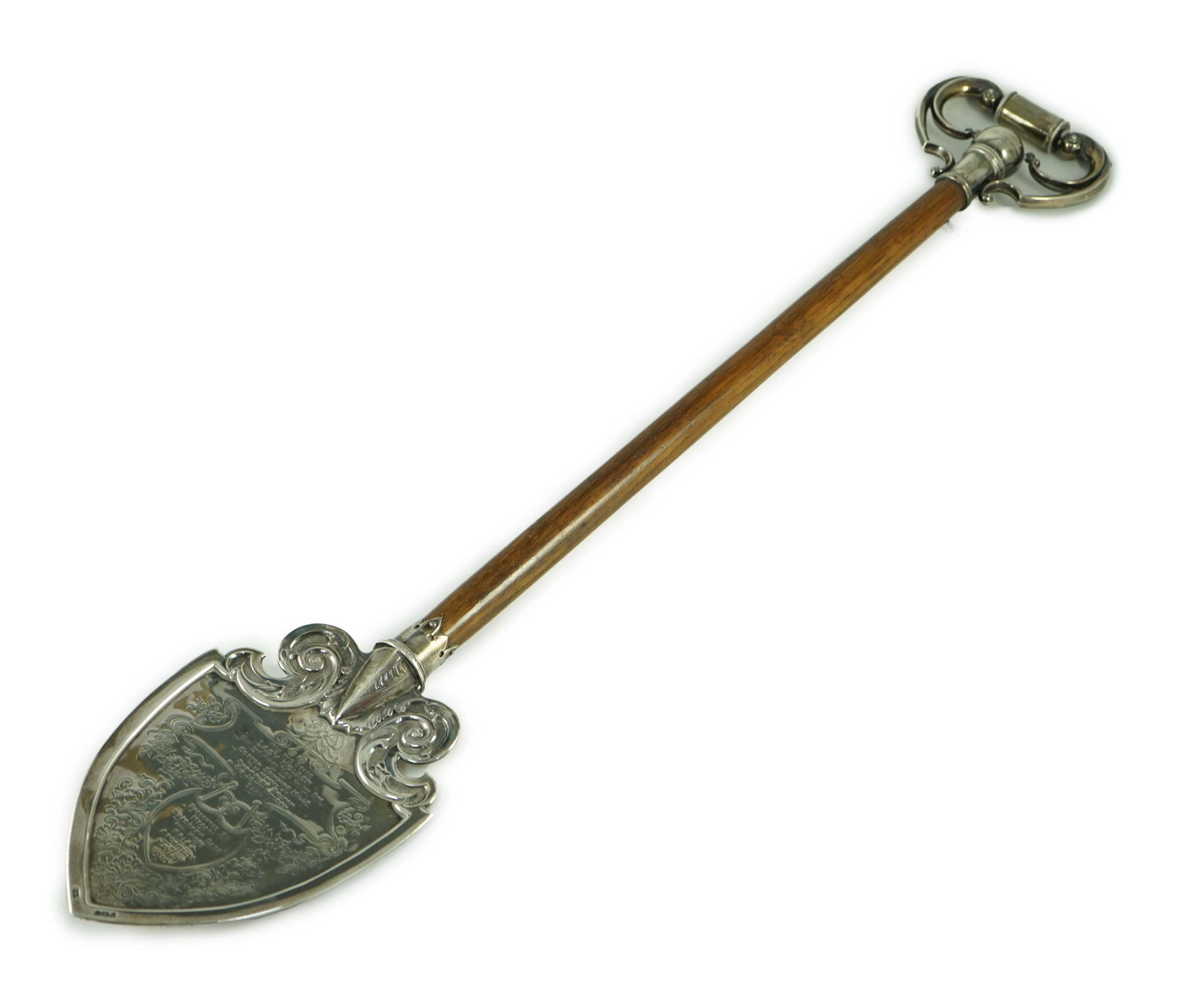 A large George V silver mounted oak presentation spade, by Vaughton & Sons